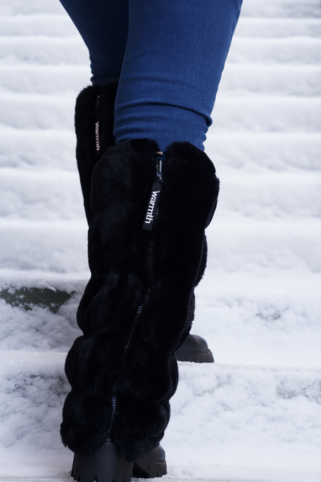 warmth flipfit original matte black reversible zip up puffer fabric & faux fur leg warmers