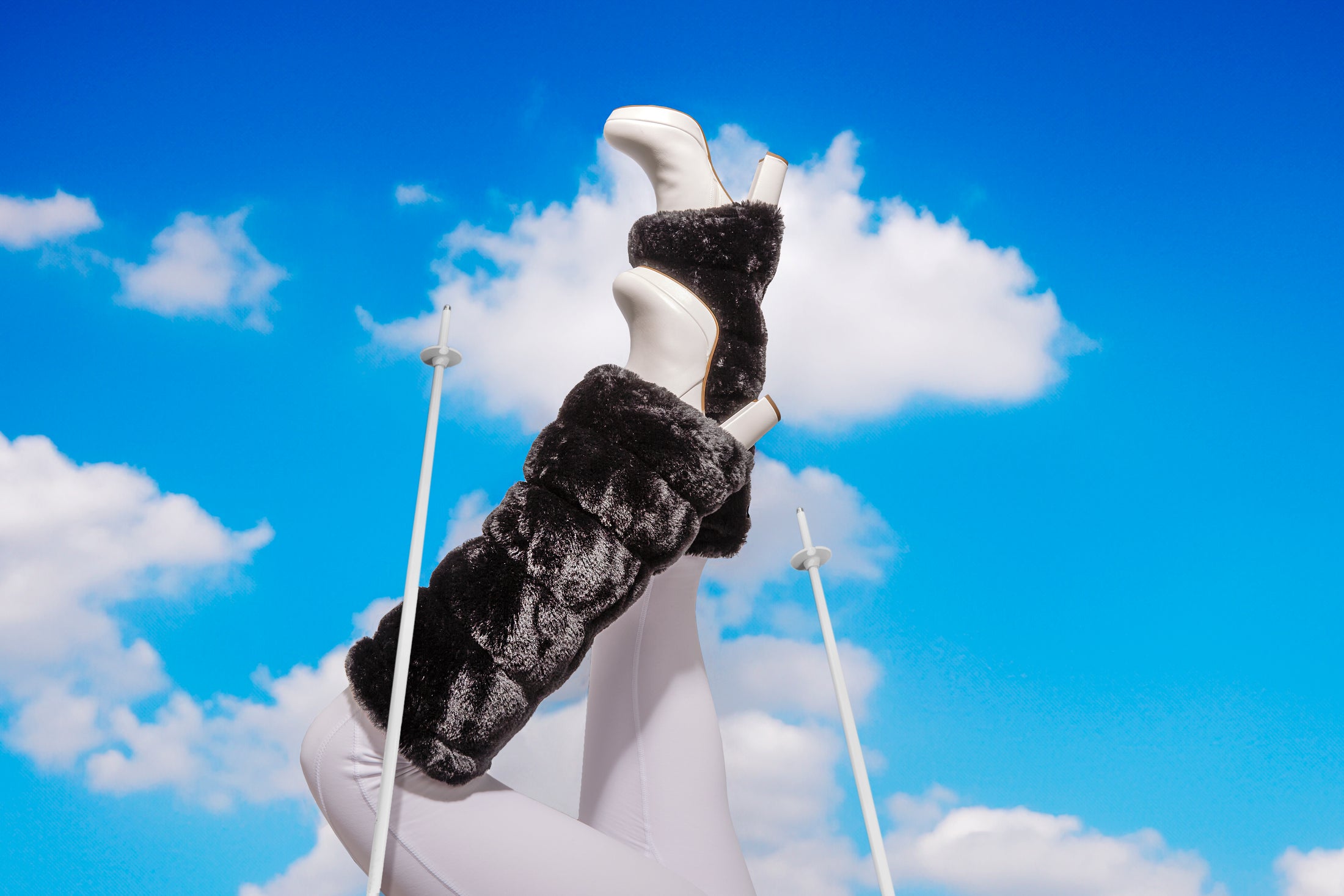 warmth flipfit original matte black reversible zip up puffer fabric & faux fur leg warmers