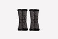 Load image into Gallery viewer, black reversible faux fur leg warmers
