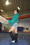 Load image into Gallery viewer, warmth flip fit black reversible zip up puffer fabric & faux fur leg warmers
